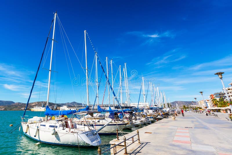 Sailing Ships and Yachts Moored in the Port of Volos, Greece Stock