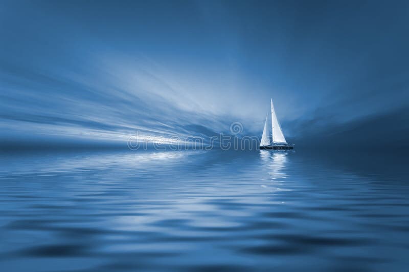 Sailing and sunset royalty free stock image