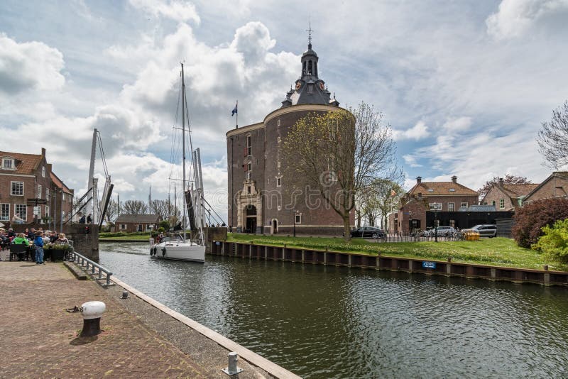 A sailing vessel enters the harbor of Enkhuizen stock image A sailing vessel enters the harbor of Enkhuizen stock image
