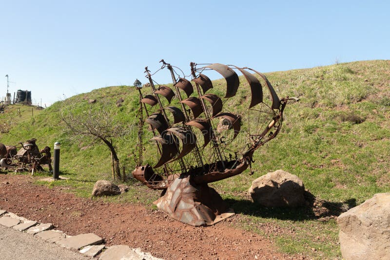 Qatsrin, Israel, February 13, 2021 : A sailing vessel sculpture made from scrap metal left behind by soldiers after the cessation of hostilities in 1973 on Mount Bental, in the Golan Heights, in northern Israel