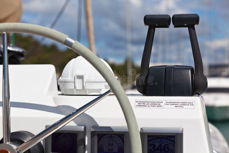 Sailing yacht control wheel and implement stock photo Sailing yacht control wheel and implement stock photo