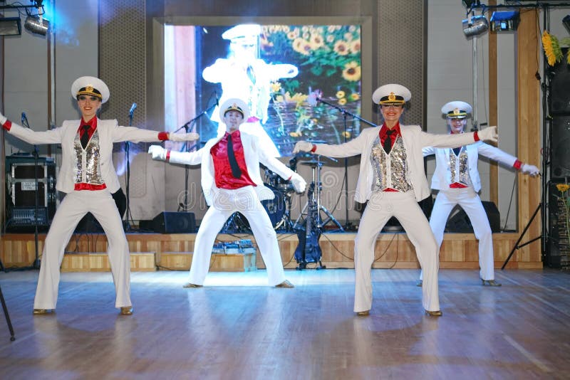 Performance, concert in the restaurant of the country club Dacha 06.07.2012. St. Petersburg, Russia, Europe. in a sailor uniform. traditional ritual dance of Russian sailors and military soldiers. Performance, concert in the restaurant of the country club Dacha 06.07.2012. St. Petersburg, Russia, Europe. in a sailor uniform. traditional ritual dance of Russian sailors and military soldiers