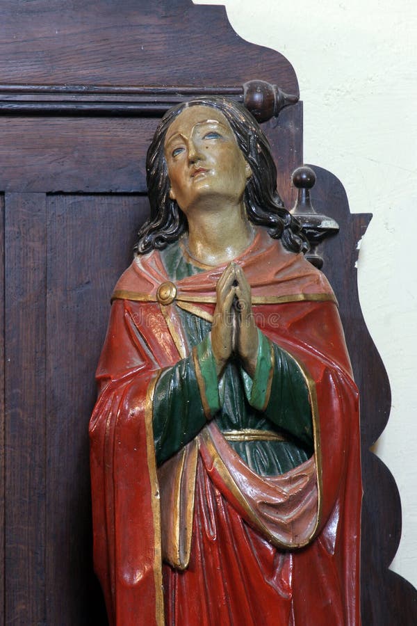 Saint John under the cross, statue in the parish Church of St. Margaret in Dubrava, Croatia. Saint John under the cross, statue in the parish Church of St. Margaret in Dubrava, Croatia