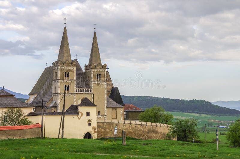 Saint Martins gothic cathedral and wall of fortness from west. U