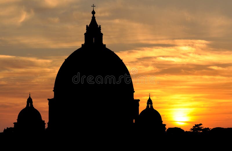 Saint Peter's Basilica at sunset in Vatican City, Rome stock image Saint Peter's Basilica at sunset in Vatican City, Rome stock image