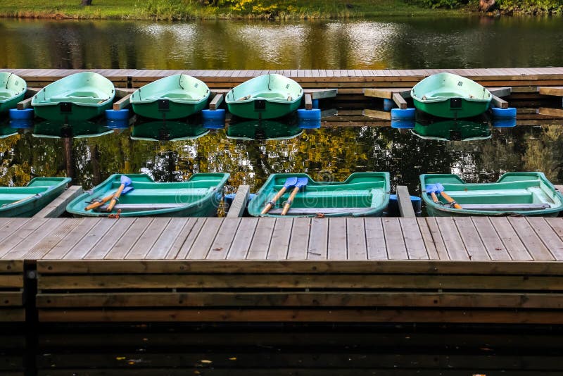 Beautiful autumn, boats moored at the rental station royalty free stock image Beautiful autumn, boats moored at the rental station royalty free stock image