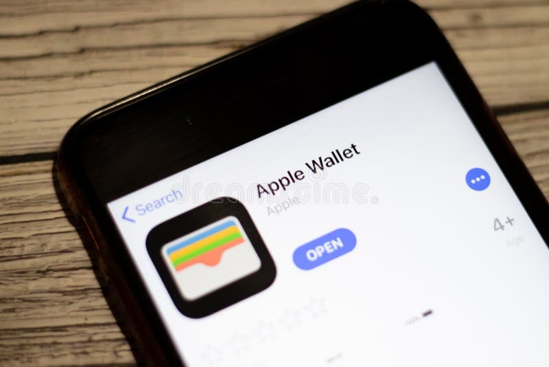 Saint-Petersburg, Russia - 25 December 2019: Apple Wallet icon on App Store page close up top view on phone screen, Illustrative royalty free stock image