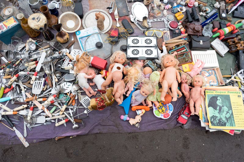 Saint Petersburg, Russia: old dolls and other second-hand Russian and Soviet items at the flea market at Udelnaya Metro Station. Saint Petersburg, Russia stock image Saint Petersburg, Russia: old dolls and other second-hand Russian and Soviet items at the flea market at Udelnaya Metro Station. Saint Petersburg, Russia stock image