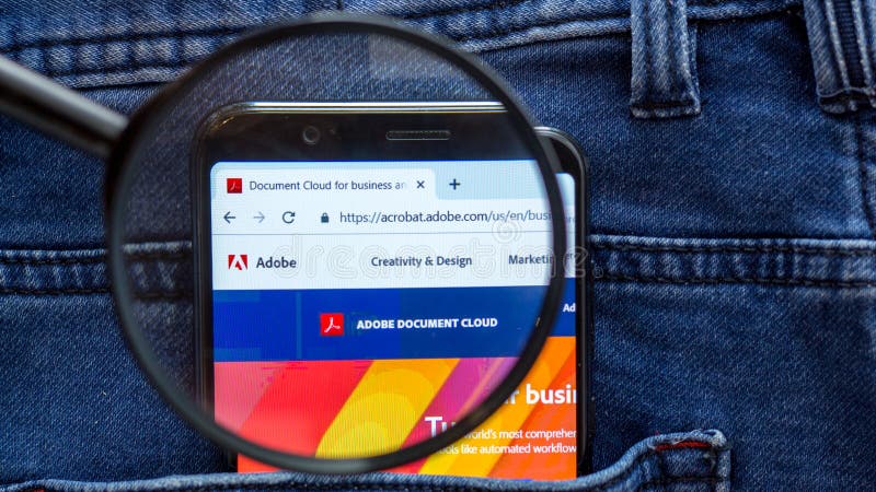 adobe website homepage. adobe logo visible on on the smartphone display royalty free stock photos adobe website homepage. adobe logo visible on on the smartphone display royalty free stock photos