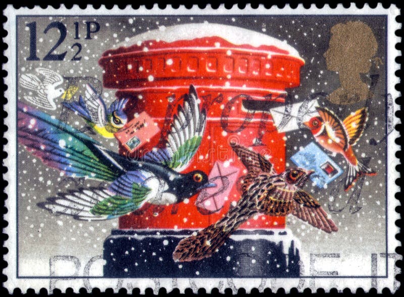 Saint Petersburg, Russia - March 21, 2020: Postage stamp issued in the United Kingdom with the image of The Christmas Post, pillar royalty free stock photography Saint Petersburg, Russia - March 21, 2020: Postage stamp issued in the United Kingdom with the image of The Christmas Post, pillar royalty free stock photography