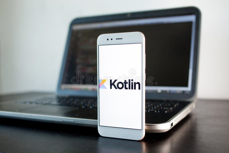 SAINT PETERSBURG, RUSSIA - MAY 16, 2019: Mobile application development, Kotlin programming language for mobile development. Workplace of programmer, tester, laptop, illustrative editorial