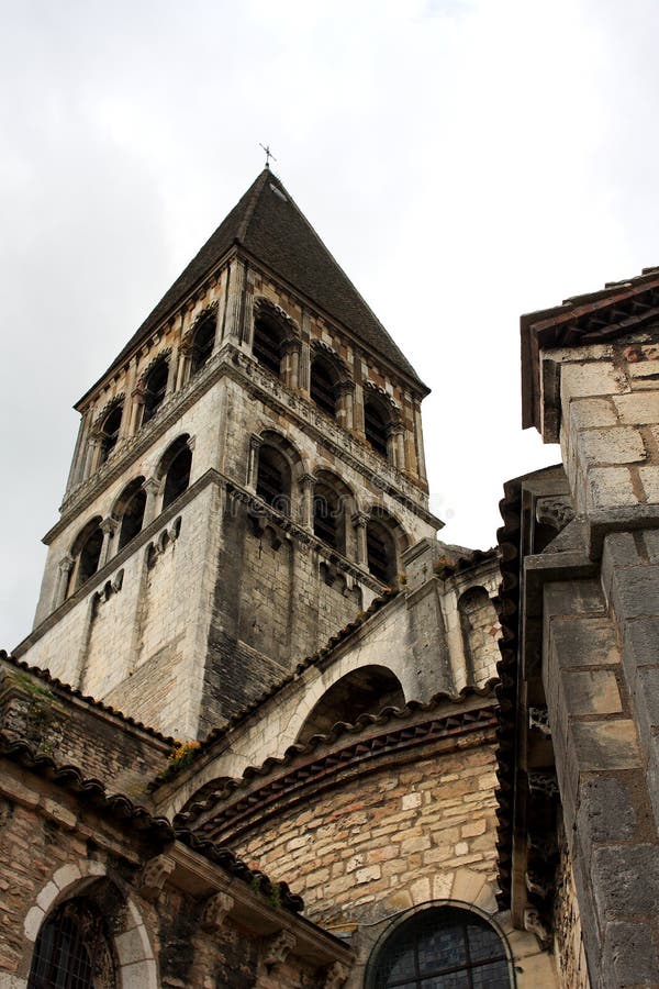 The bell tower of saint philibert church , tournus, france. The bell tower of saint philibert church , tournus, france