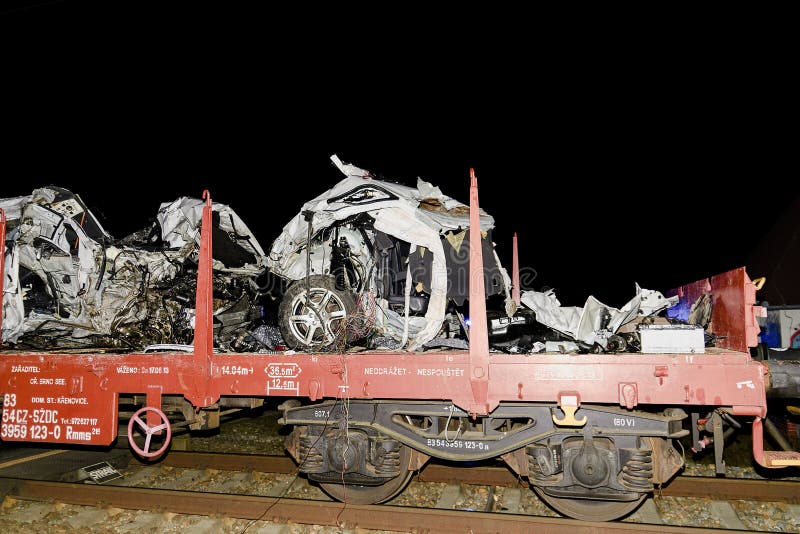 SAKVICE, THE CZECH REPUBLIC - JANUARY 14, 2018: The crashed car is transported away. Real car crash with train. The woman driver is dead.