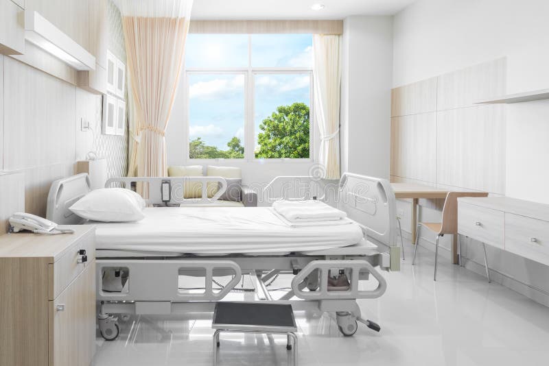 Sala szpitalna z łóżkami i wygodny medycznym wyposażającymi w mo