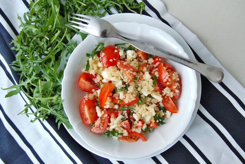 Salad with Arubula, Tomato, Quinoa and Cheese Stock Image Image of