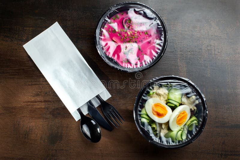 Salad box for delivery with wooden table. Salad.Box. royalty free stock image Salad box for delivery with wooden table. Salad.Box. royalty free stock image