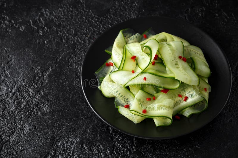 Salad of Cucumber Slices with Salt, Pepper and Red Pepper Stock Image Image of lunch
