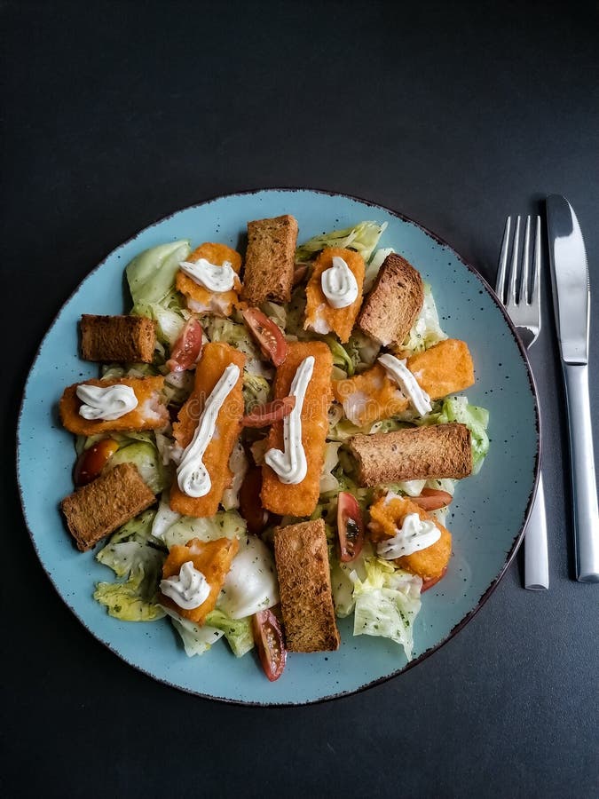 Salad with fish sticks stock photo. Image of curry, salad 222718032