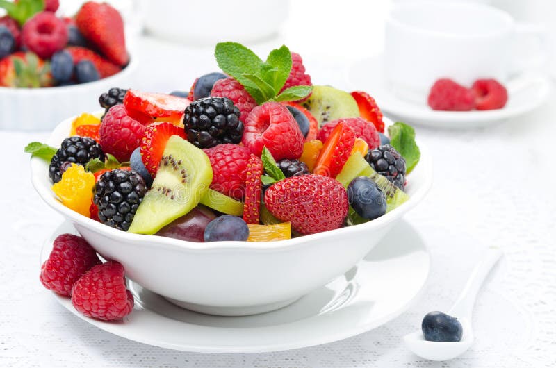 Salad of fresh fruit and berries in a bowl