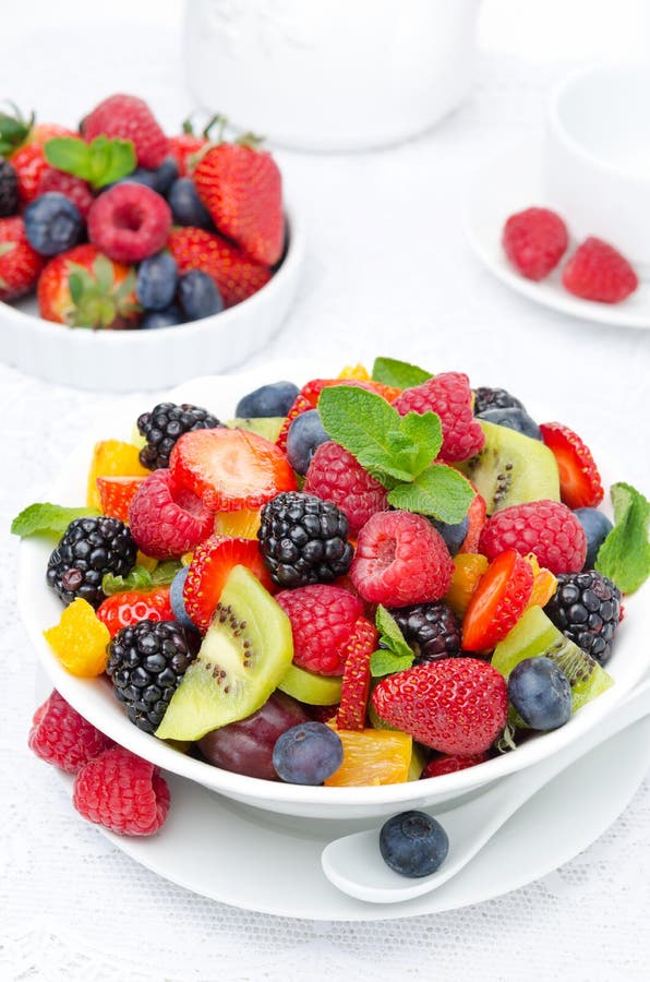 Salad of fresh fruit and berries in a bowl