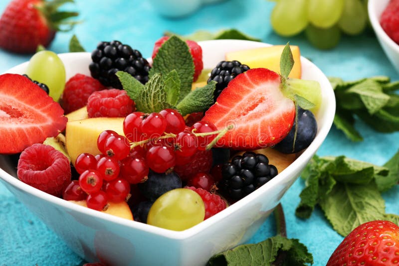 Salad with Fresh Fruits and Berries. Healthy Spring Fruit Salad Stock