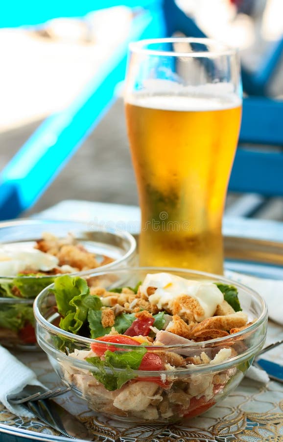 Salad and glass of beer