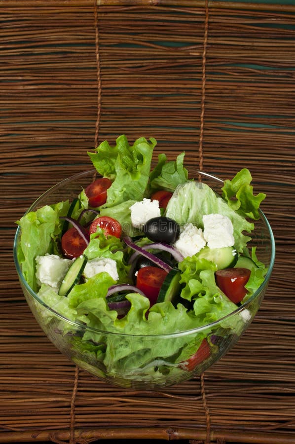 Salad in a Glass Bowl on a Wooden Base Stock Image Image of green
