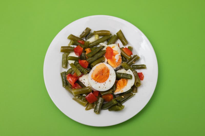 Salad Green Beans, Pepper and Boiled Eggs on Plate Stock Photo Image