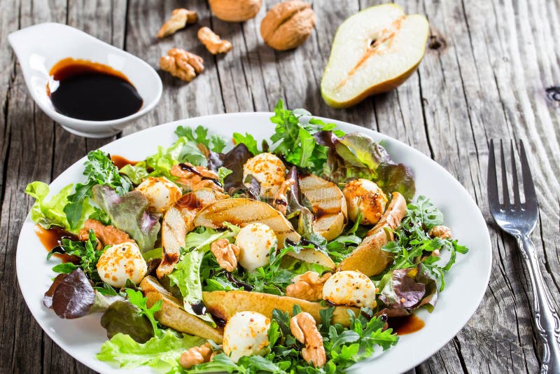 Salad with Grilled Pears, Baby Mozzarella Balls, Oakleaf Lettuce and Walnuts Stock Image Image