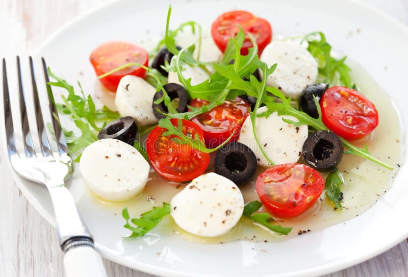 Salad with Mozzarella, Tomatoes and Black Olive Stock Image Image of