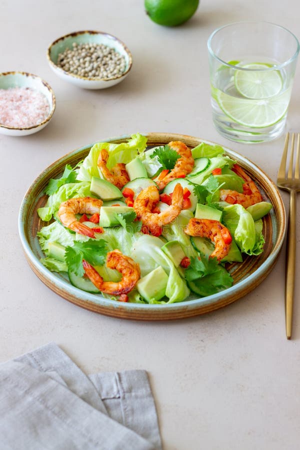 Salad with Shrimp, Cucumbers and Avocado. Healthy Eating Stock Photo