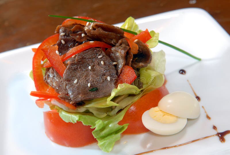 Salad from vegetables and beef meat