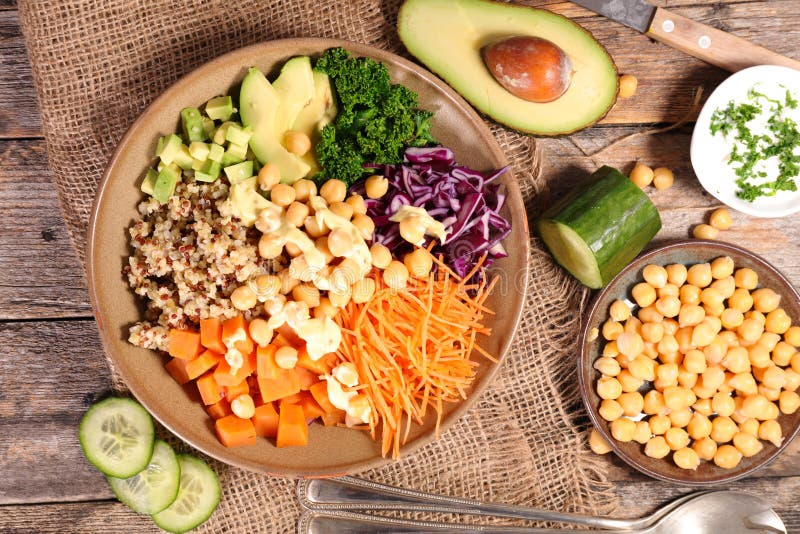 Vegetarian bowl salad on wood. Vegetarian bowl salad on wood