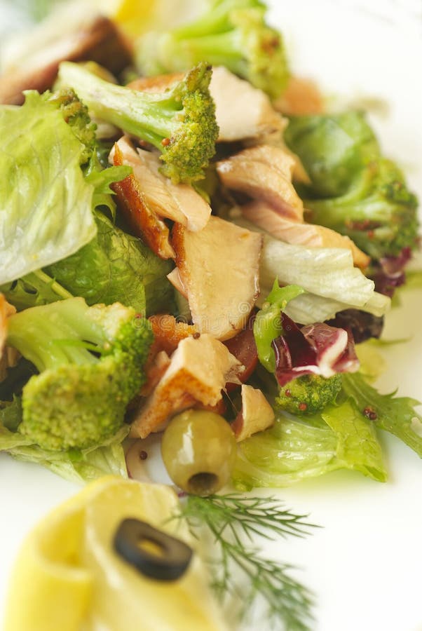 Vegetables salad with salmon, olives and broccoli. Vegetables salad with salmon, olives and broccoli