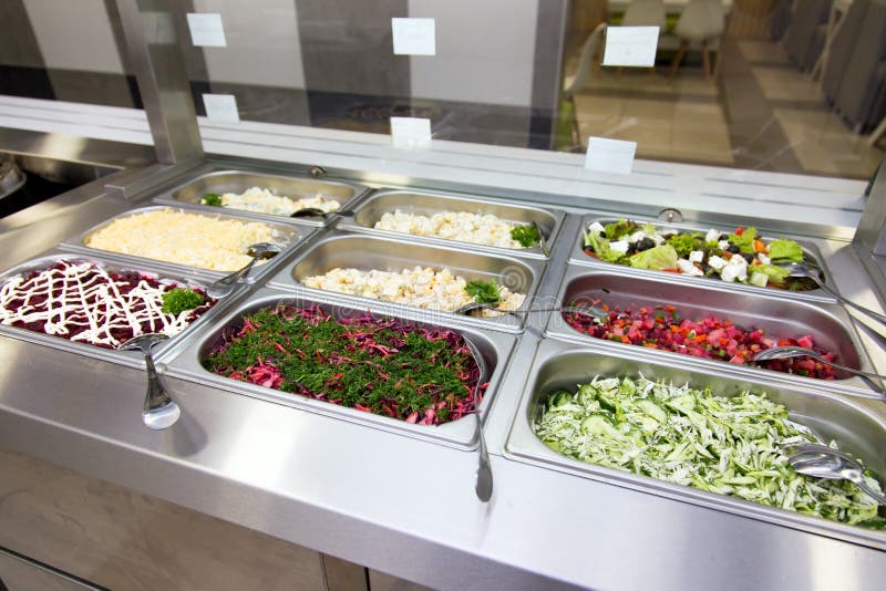 Salads in Buffet on the Metal Plates. Stock Photo Image of closeup
