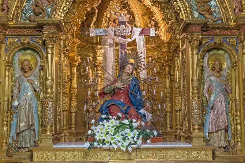 Salamanca - The carved polychrome baroque altar of Our Lady of Sorrow Capilla de los Dolores in church Iglesia de la Vera Cruz