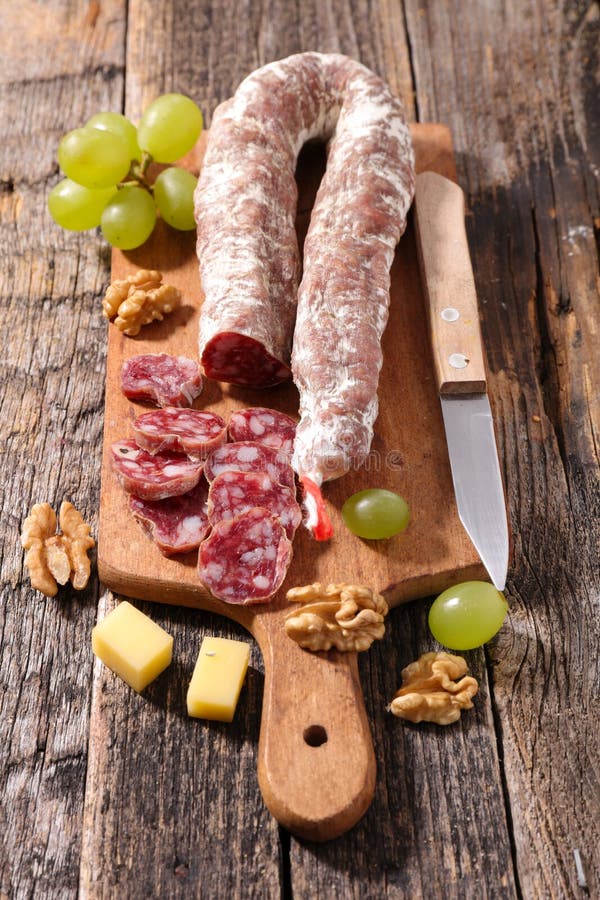 Salami on board stock image. Image of meat, slice, cheese 70895859