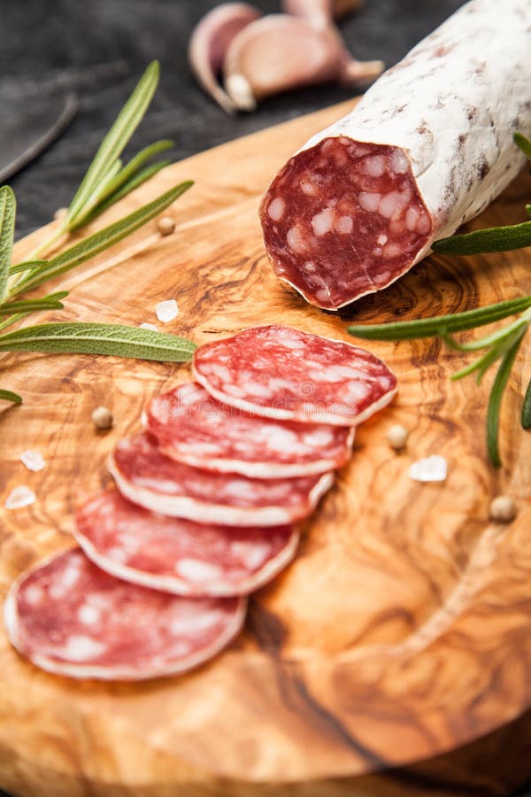 Salami on dark background