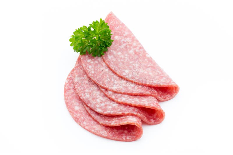 Salami rökte korvskivor som isoleras på vit bakgrund arkivfoto Salami rökte korvskivor som isoleras på vit bakgrund arkivfoto