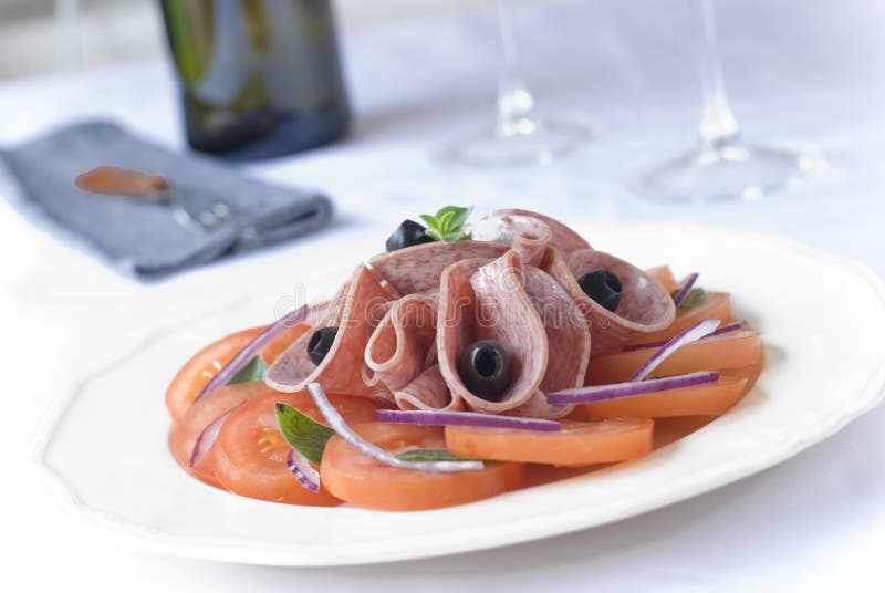 Salami & tomato salad stock photo. Image of tasty 19333832