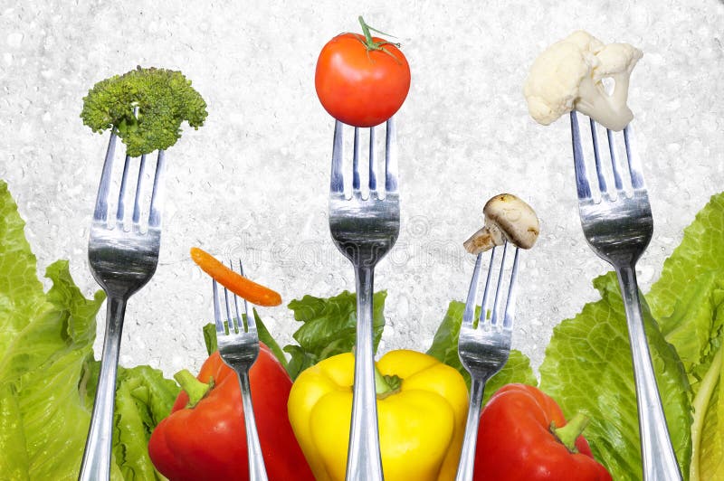 Salatgemüse auf Gabeln lizenzfreies stockfoto Salatgemüse auf Gabeln lizenzfreies stockfoto