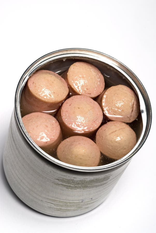 Vienna sausage links made with chicken beef and pork in chicken broth in tin can package. Vienna sausage links made with chicken beef and pork in chicken broth in tin can package