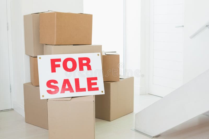 For Sale Sign with Many Cardboard Boxes Stock Image Image of light