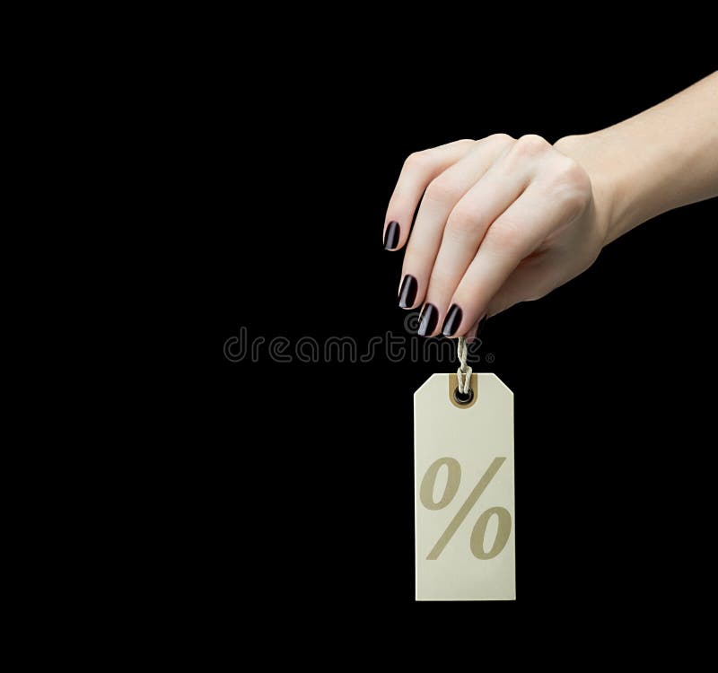 Sale Tag on women hand with percent sign