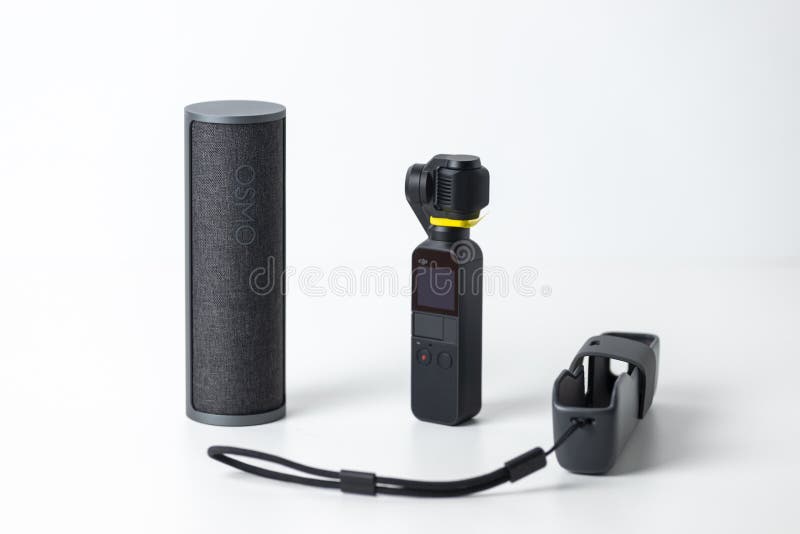 Salerno, Italy - Apr 21, 2020: Studio shot of the brand new DJI Osmo Pocket gimbal camera and cases stock image