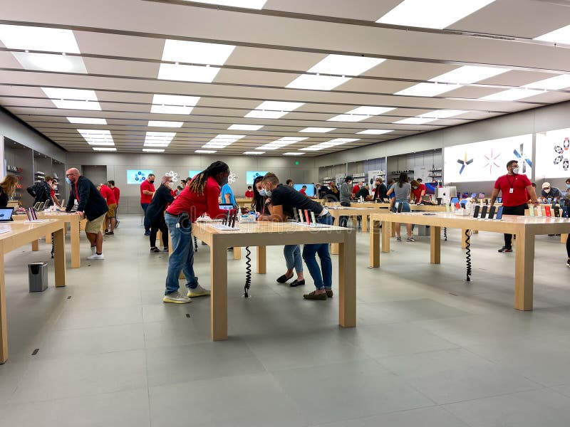 Salespeople and Customers at an Apple Store Looking at the Latest Apple  Products for Sale Editorial Stock Photo - Image of american, international:  203627338