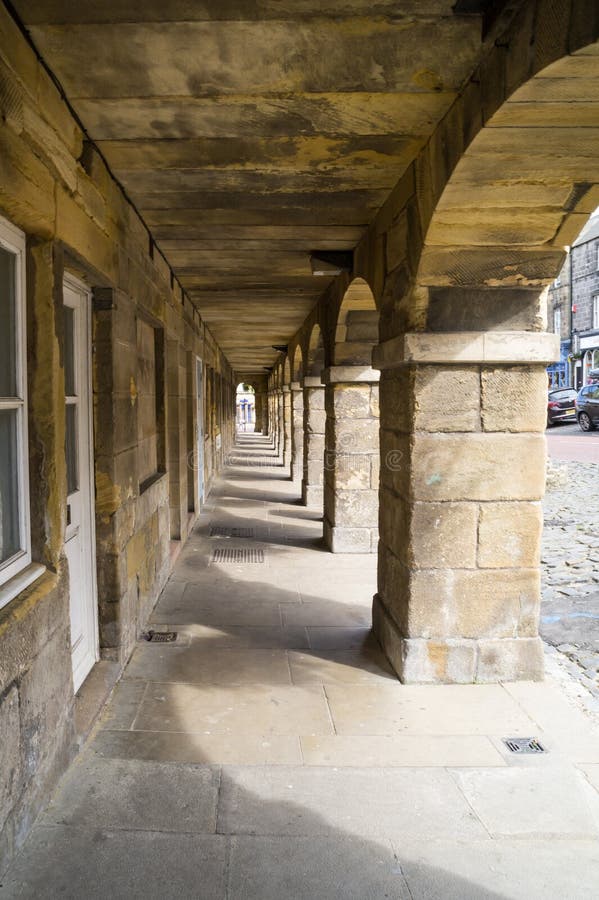 Medieval stone archway in Alnwick, Northumberland, with subdued reflected light giving a pronounced 3D effect. Medieval stone archway in Alnwick, Northumberland, with subdued reflected light giving a pronounced 3D effect