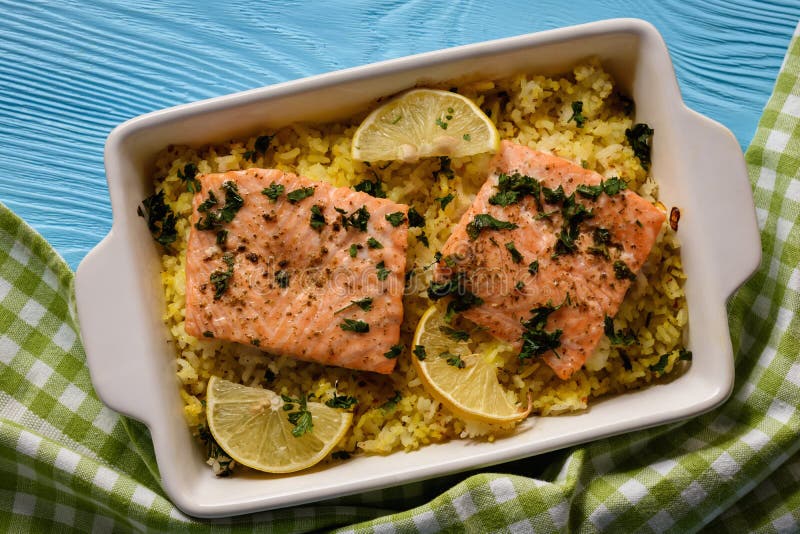 Salmon Baked on Oven with Rice and Lemon. Stock Photo Image of