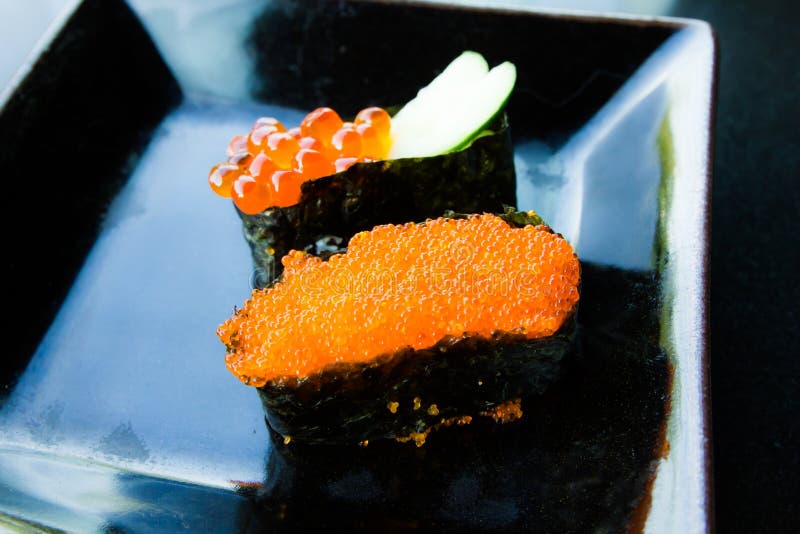 Salmon eggs sushi stock image. Image of isolated, roll 40935047