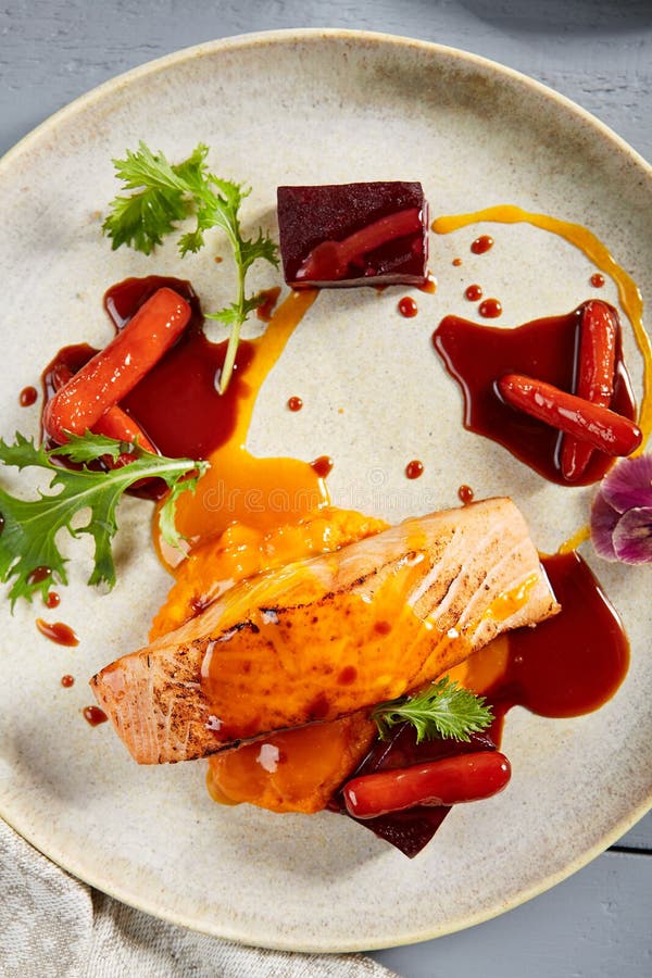 Salmon Fillet with Beet in Herbs and Passion Fruit Sauce Close Up Stock ...